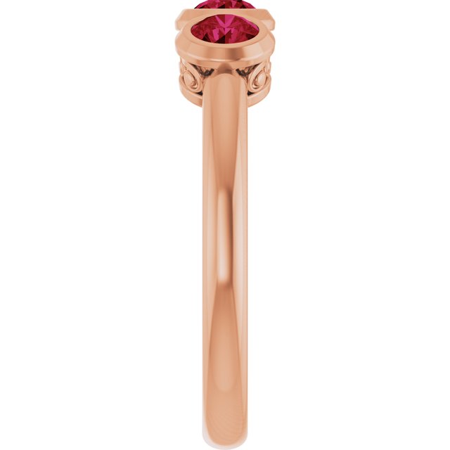 Round Ruby Three Stone Ring in Gold