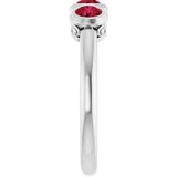 Round Lab-Grown Ruby Three Stone Ring in Platinum