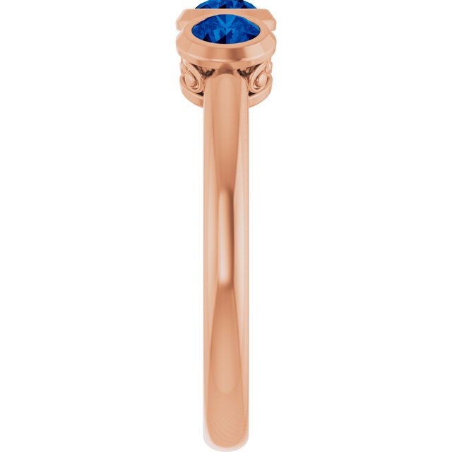 Round Lab-Grown Blue Sapphire Three Stone Ring in Rose Gold