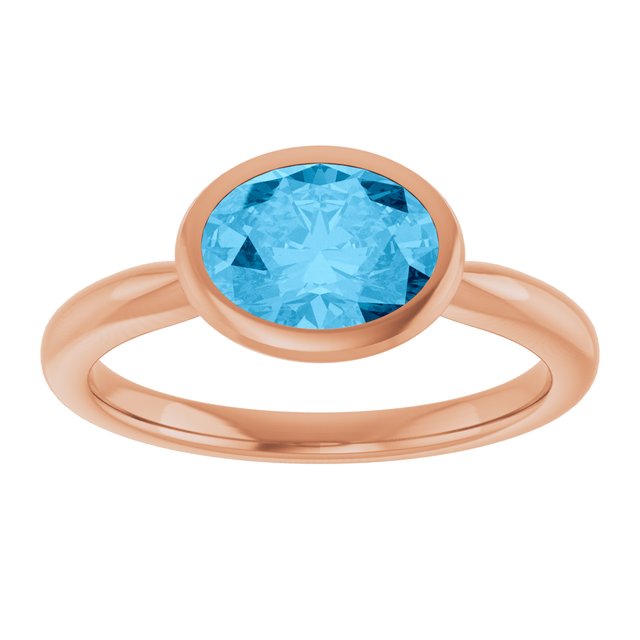 Natural Swiss Blue Topaz Rose Gold Solitaire Ring in | oval