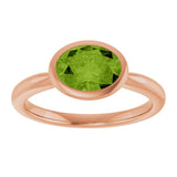 Natural Peridot Rose Gold Solitaire Ring in | oval