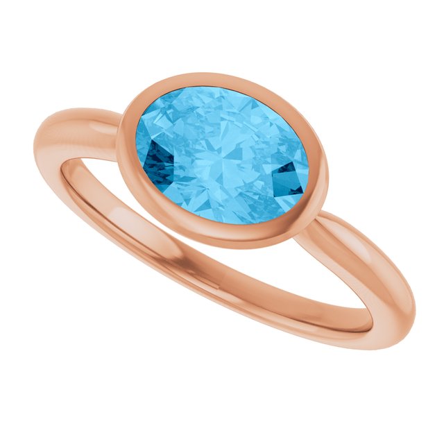 Natural Swiss Blue Topaz Rose Gold Solitaire Ring in | oval