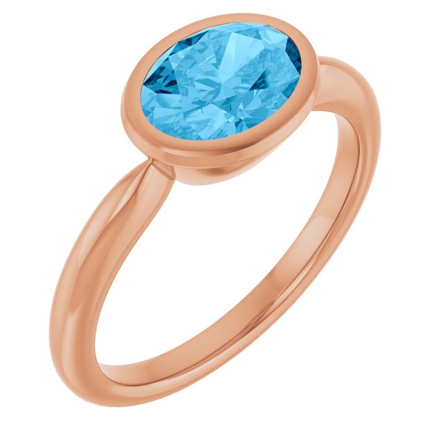 Natural Swiss Blue Topaz Rose Gold Solitaire Ring in | oval
