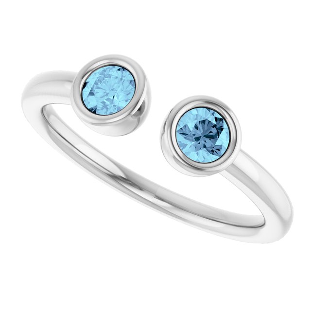 Round Aquamarine Negative Space Ring in Gold and Platinum