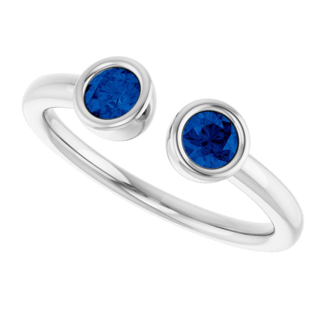 Round Blue Sapphire Negative Space Ring in Gold and Platinum