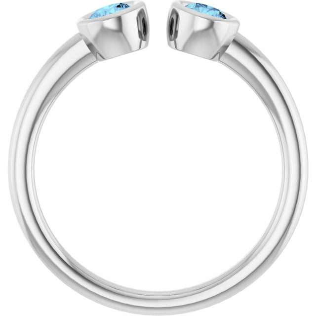 Round Aquamarine Negative Space Ring in Gold and Platinum