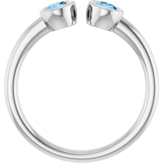 Round Aquamarine Negative Space Ring in Gold and Platinum