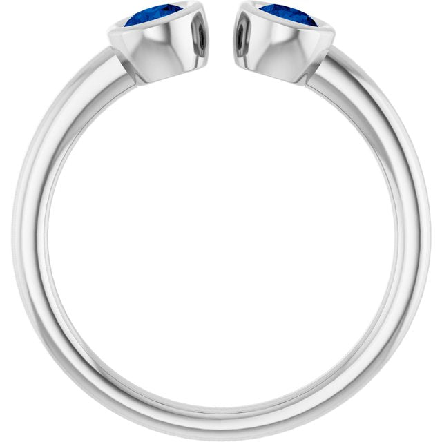 Round Blue Sapphire Negative Space Ring in Gold and Platinum