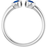 Round Blue Sapphire Negative Space Ring in Gold and Platinum