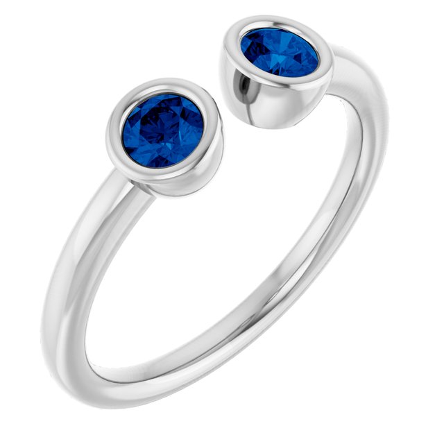 Round Blue Sapphire Negative Space Ring in Gold and Platinum