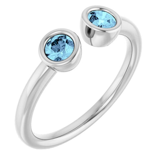 Round Aquamarine Negative Space Ring in Gold and Platinum