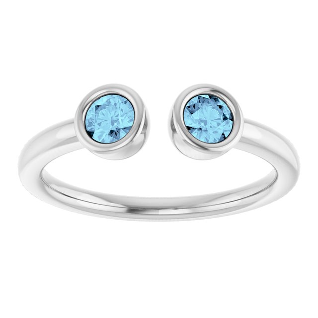 Round Aquamarine Negative Space Ring in Gold and Platinum