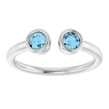 Round Aquamarine Negative Space Ring in Gold and Platinum