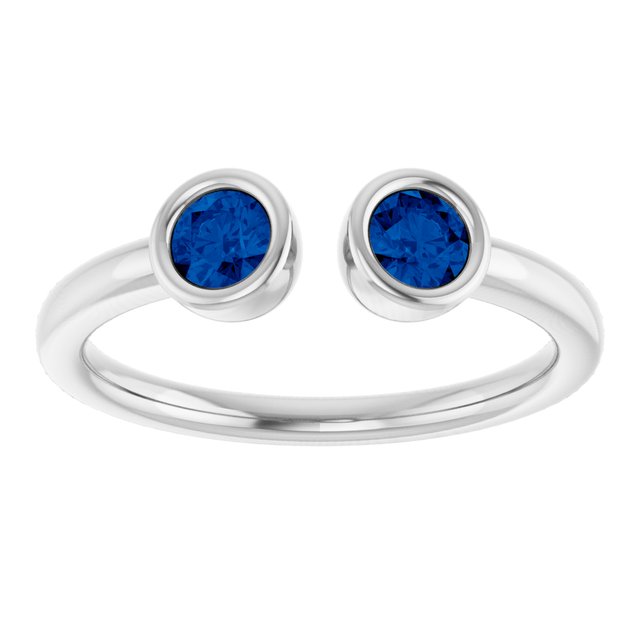 Round Blue Sapphire Negative Space Ring in Gold and Platinum