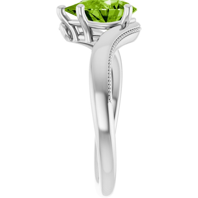 Pear Peridot Solitaire Ring in Gold and Platinum