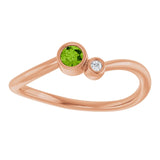 Round Peridot Two Stone Ring with Diamond Accents in Rose Gold