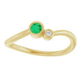 Round Emerald Two Stone Ring with Diamond Accents in Yellow Gold