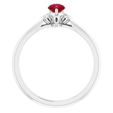 Pear Ruby Accented Ring with Diamond Accents in Gold and Platinum