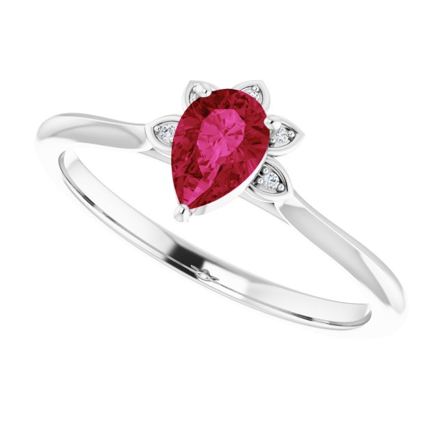 Pear Ruby Accented Ring with Diamond Accents in Gold and Platinum