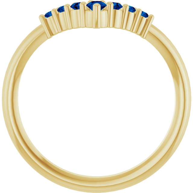 Round Blue Sapphire Accented Ring in Yellow Gold