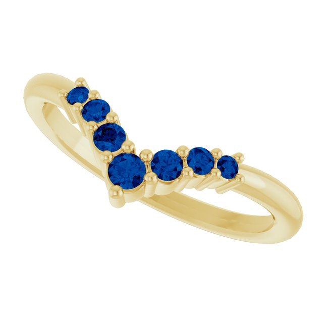 Round Blue Sapphire Accented Ring in Yellow Gold