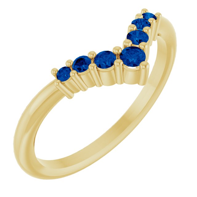 Round Blue Sapphire Accented Ring in Yellow Gold