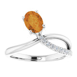 Oval Citrine Halo Ring with Diamond Accents in Gold and Platinum