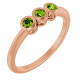 Round Peridot Three Stone Ring in Rose Gold