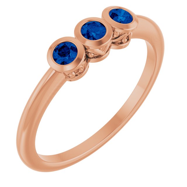 Round Blue Sapphire Three Stone Ring in Rose Gold