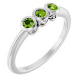 Round Peridot Three Stone Ring in Gold