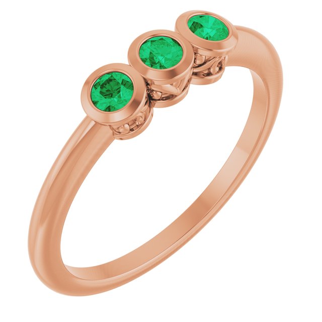 Round Emerald Three Stone Ring in Rose Gold