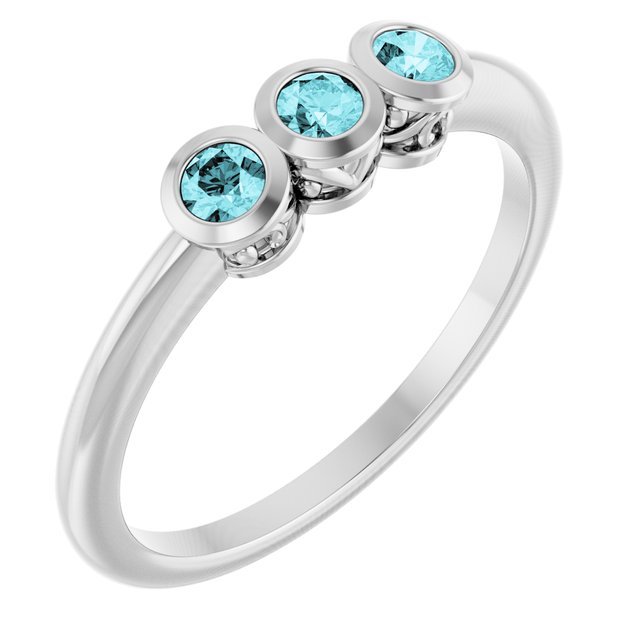 Round Blue Zircon Three Stone Ring in Platinum