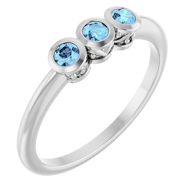 Round Aquamarine Three Stone Ring in Platinum