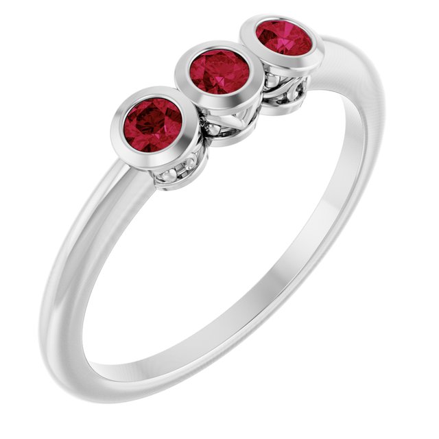 Round Ruby Three Stone Ring in Platinum