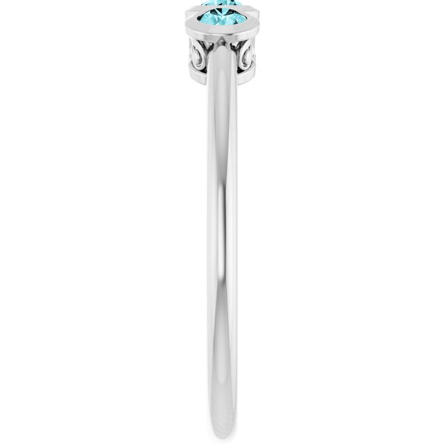 Round Blue Zircon Three Stone Ring in Platinum