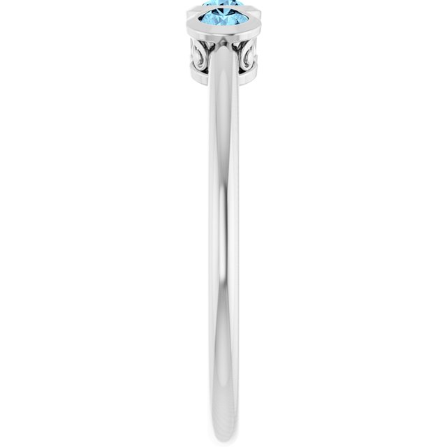 Round Aquamarine Three Stone Ring in Platinum