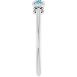 Round Aquamarine Three Stone Ring in Platinum