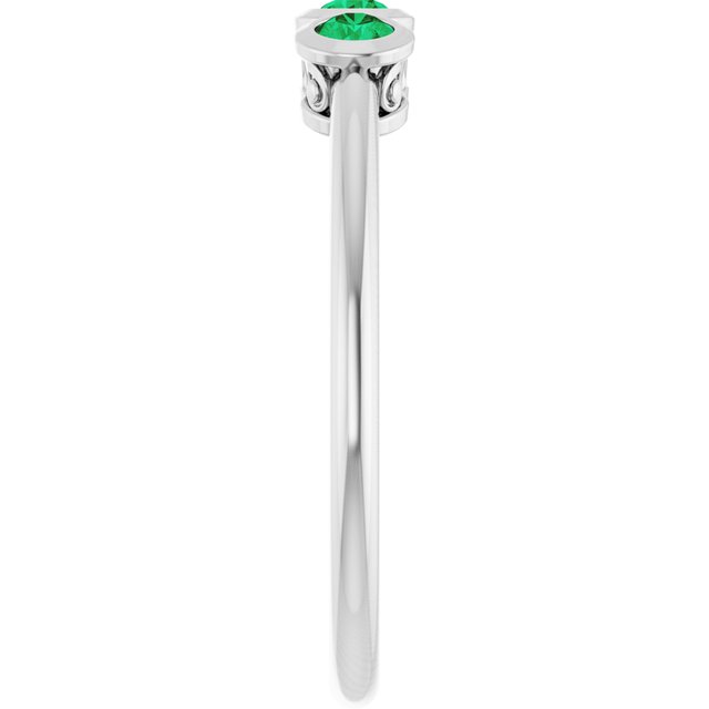 Round Emerald Three Stone Ring in Platinum