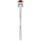 Round Mozambique Garnet Three Stone Ring in Platinum