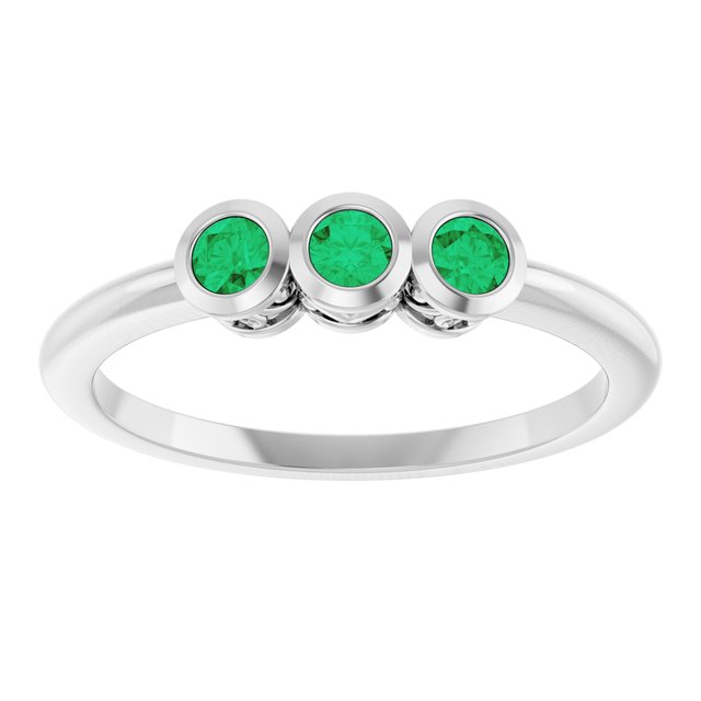 Round Emerald Three Stone Ring in Platinum