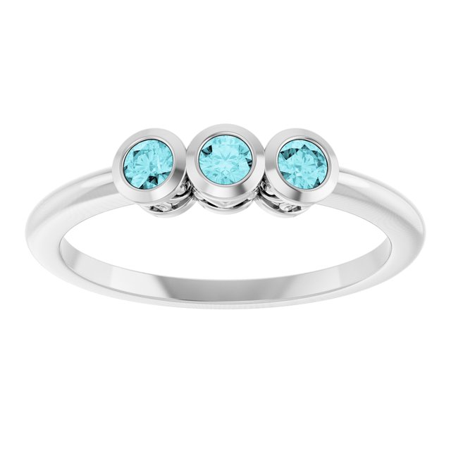 Round Blue Zircon Three Stone Ring in Platinum