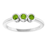 Round Peridot Three Stone Ring in Gold