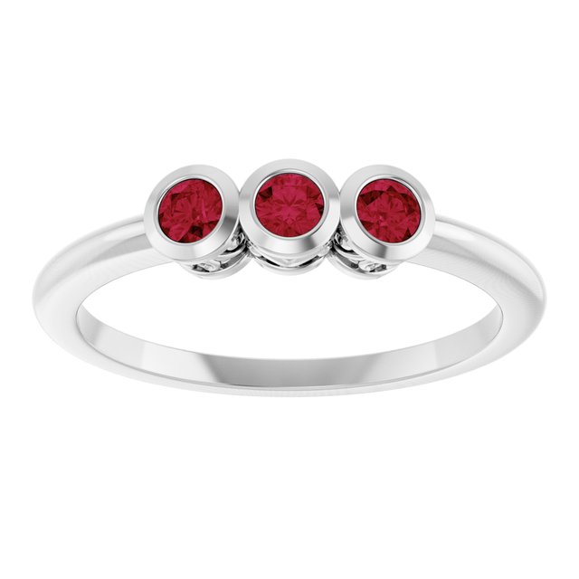 Round Ruby Three Stone Ring in Platinum