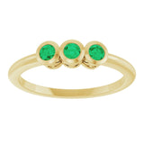 Round Emerald Three Stone Ring in Gold