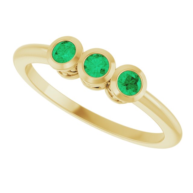 Round Emerald Three Stone Ring in Gold