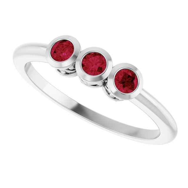 Round Ruby Three Stone Ring in Platinum