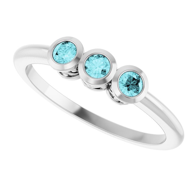 Round Blue Zircon Three Stone Ring in Platinum
