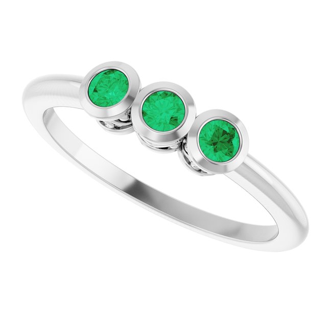 Round Emerald Three Stone Ring in Platinum