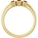 Round Mozambique Garnet Three Stone Ring in Yellow Gold