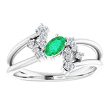 Oval Emerald Accented Ring with Diamond Accents in Platinum